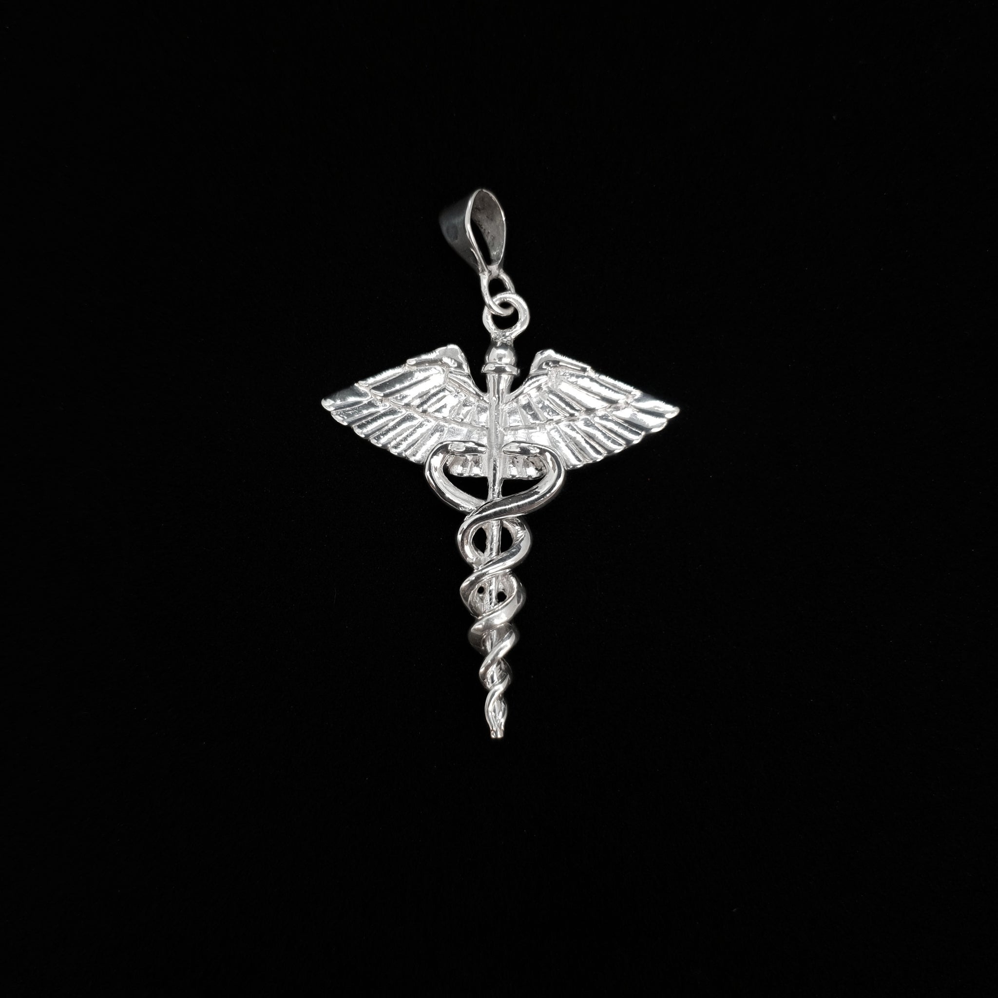 Dije Caduceo